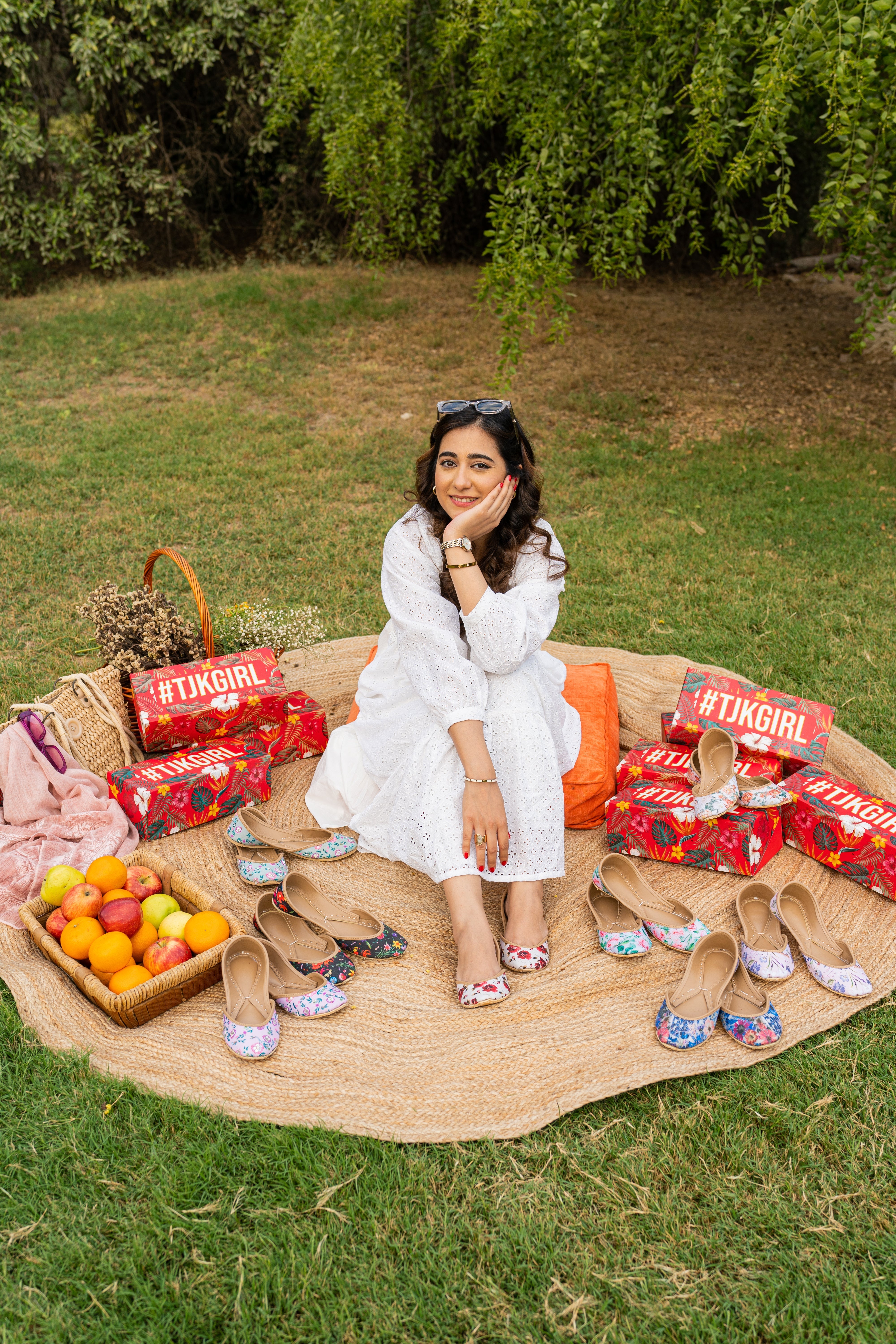 Woman wearing traditional embroidered khussa shoes with South Asian outfit